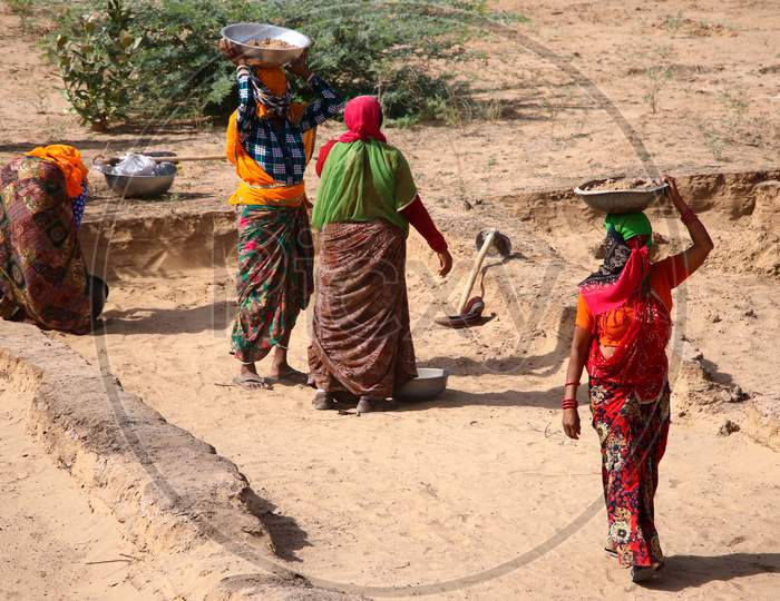 Labourers Under Mahatma Gandhi National Rural Employment Guarantee Act (Mgnrega) Work At A Site On A Hot Day  On The Outskirts Of Ajmer, Rajasthanon 29 May 2020.