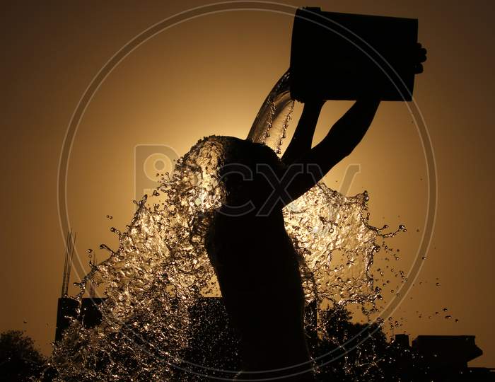 Man Takes Bath On A Hot Day In Ajmer, Rajasthan, India On 28 May 2020.