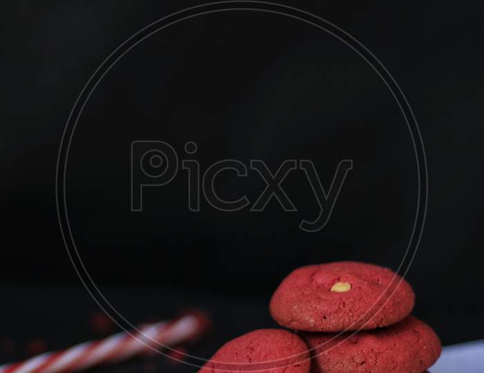 Red Velvet Cookies On A Butter Paper With Dark Background