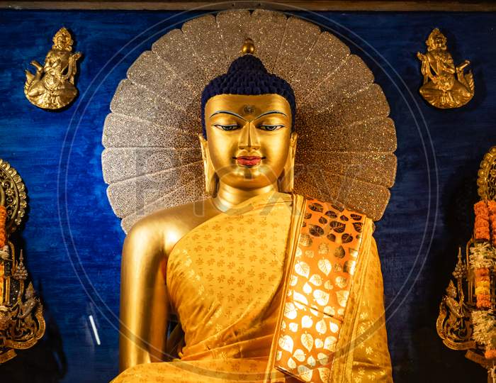 Budhha Golden Statue Isolated In Details