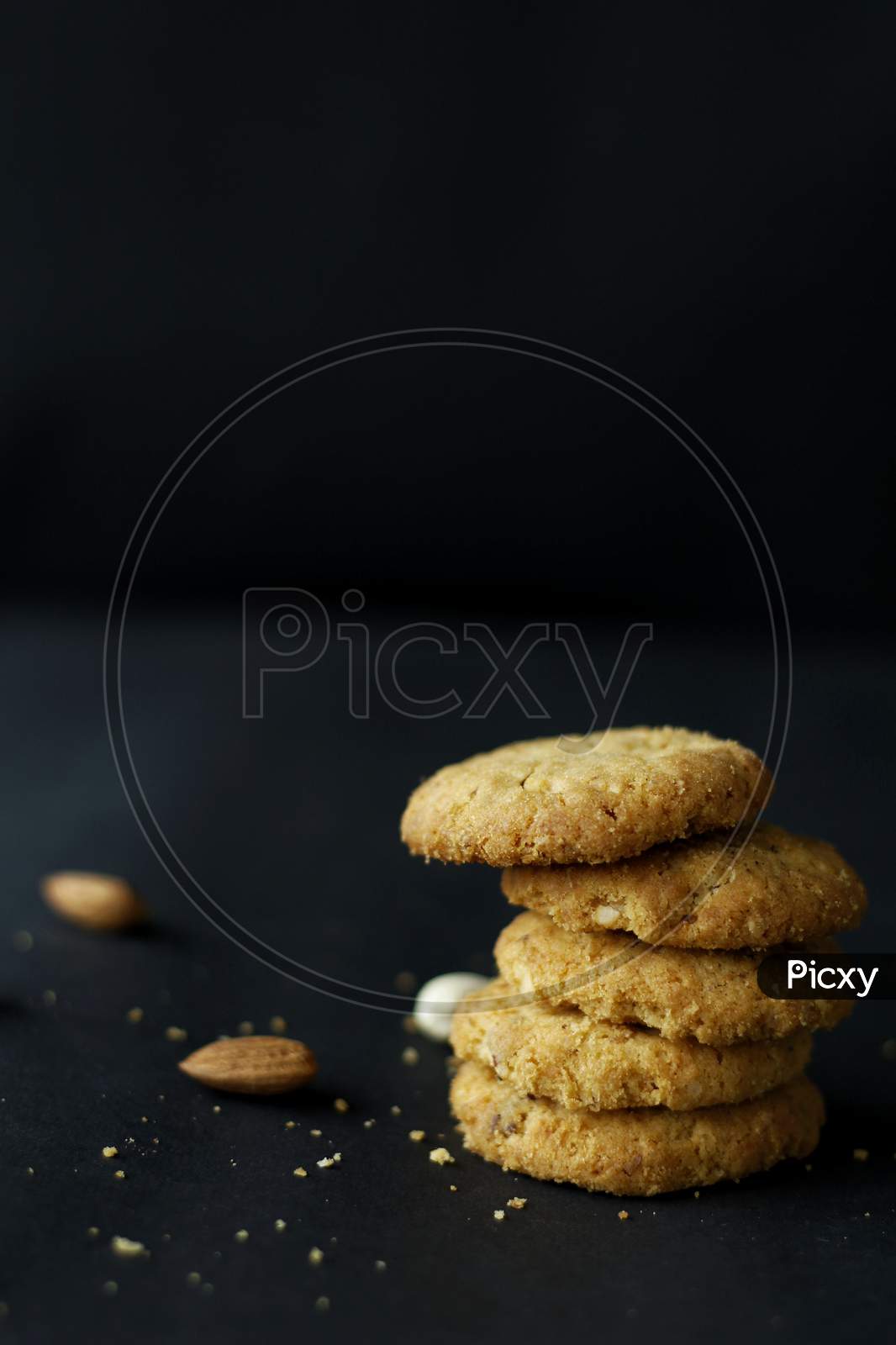 Dry Fruit Cookies Stacked On Each Other With Almonds And Cashews