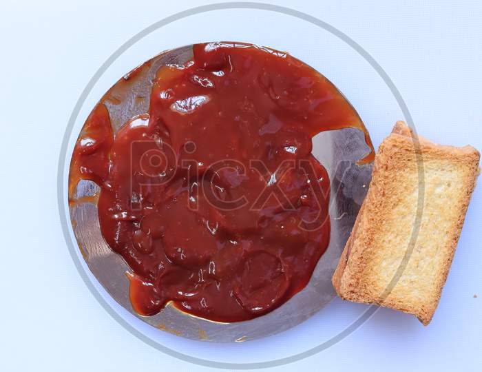 red ketchup splashes isolated on white background