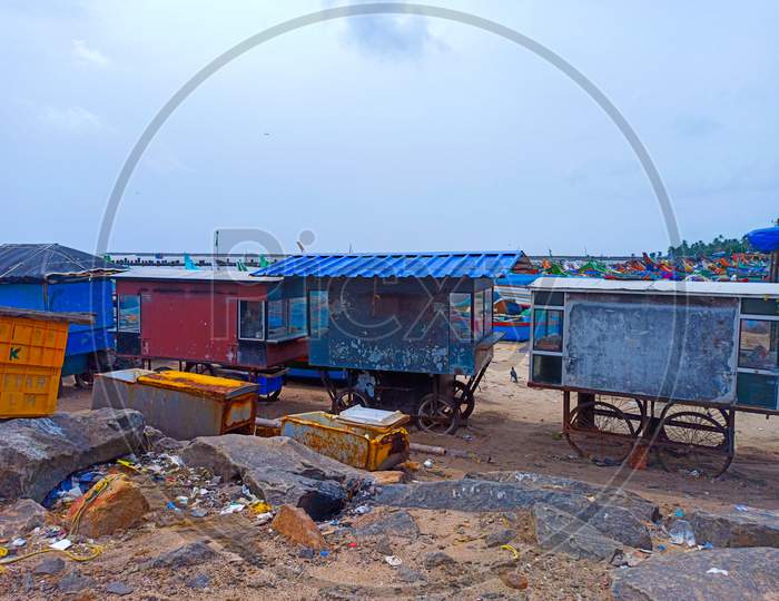 Beach movable sales counters in a harbour
