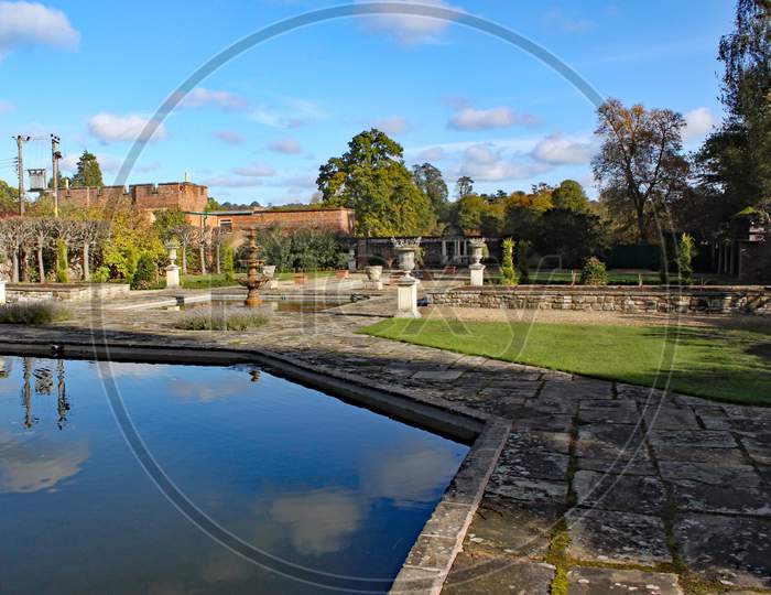 A Hexagonal Pond And Formal Gardens At Arley Arboretum In The Midlands In England.