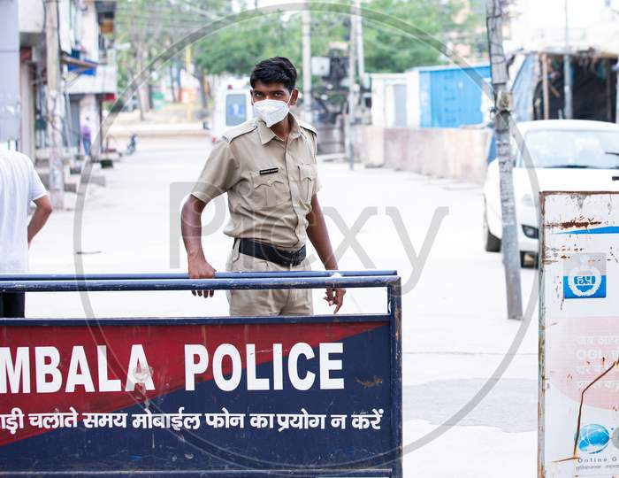 Ambala City, Haryana/India -04/30/2020  Police Blocking Roads During Duty on Red zone Area and Sealed area of Corona infection.