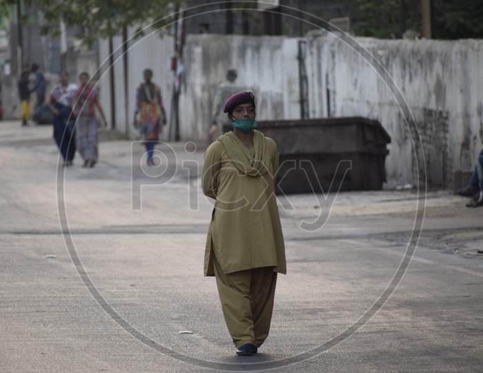 Bharuch, Gujarat / India - April 05, 2020: Covid 19 Corona Virus 21 days lockdown in India. Police on duty to stop people from roaming in the city and make them follow lockdown to prevent the spread of Corona.