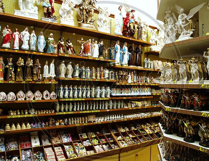 Interior of a souvenir shop with religious souvenirs in Monte Sant Angelo, Italy