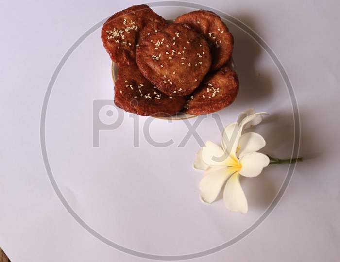 Indian Sweet Savory Arisaelu Made With Jaggery and Rice Flour On Isolated Background