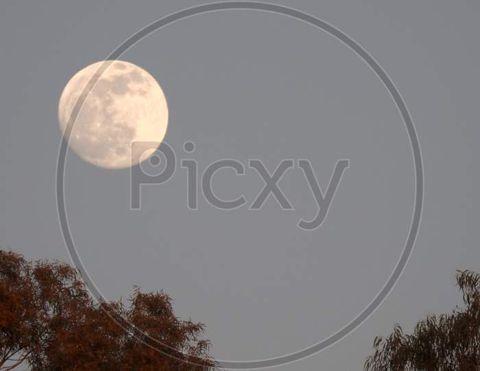 Moon in sky on afternoon