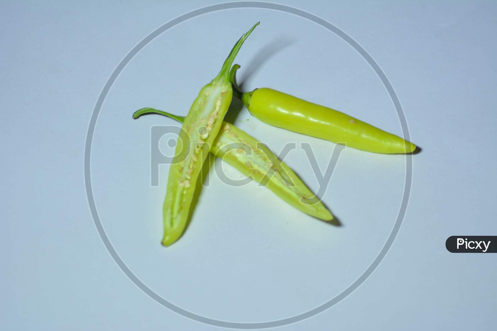 Green Chilli Or Bangalore Mirchi On Isolated Background