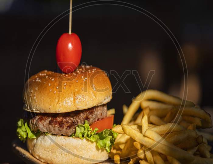 Closeup Of Home Made Burgers On Wooden Background