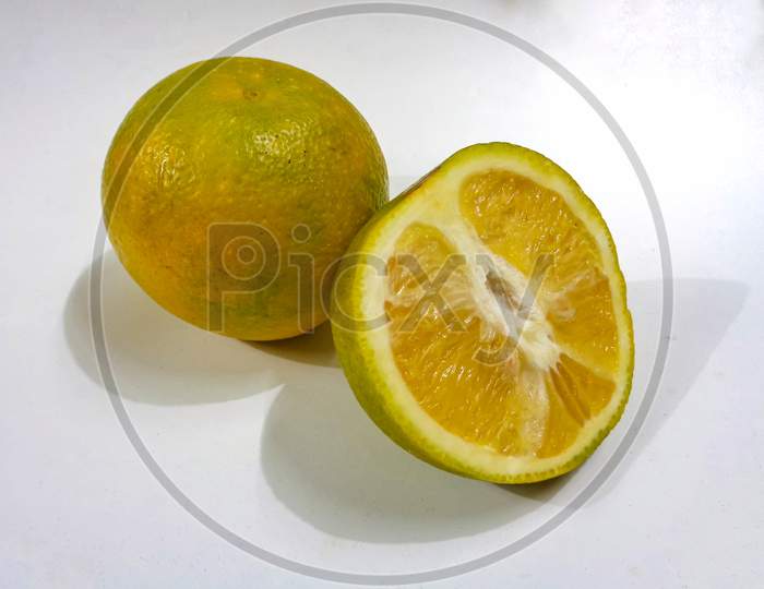 Mosambi or sweet lemon isolated on white background