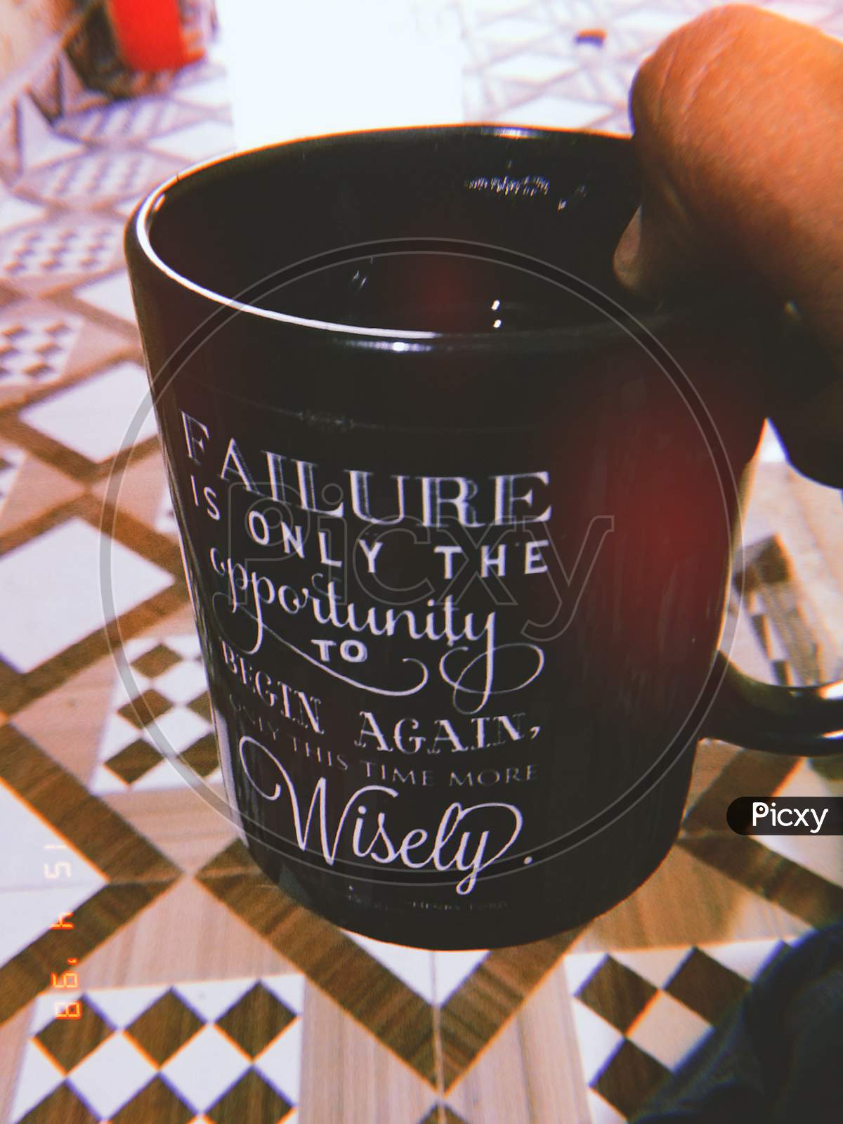 cup of coffee with a quote 