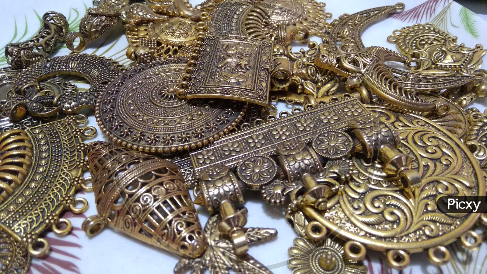 Metal and Bronze carving fashion accessory jewellery