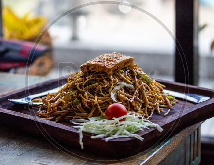 paneer chowmein in a plate