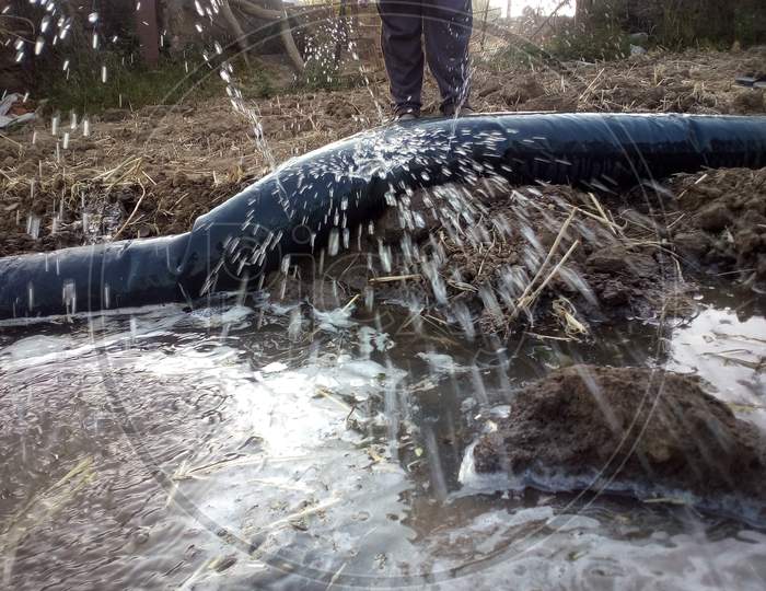 Water Fountain leaking from a pipeline at a farm