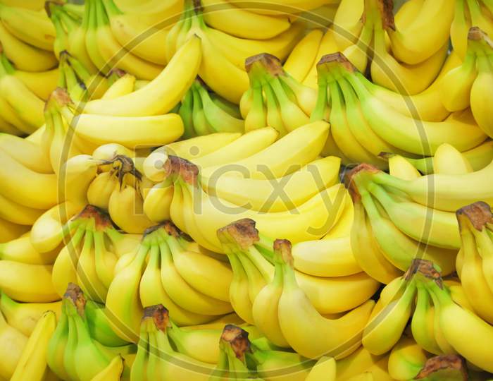 Fresh Banana Yellow Background In The Fruit Market.