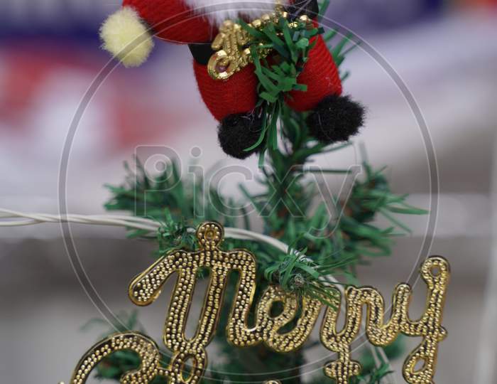 Decorated Christmas tree on blurred, sparkling and blurry background