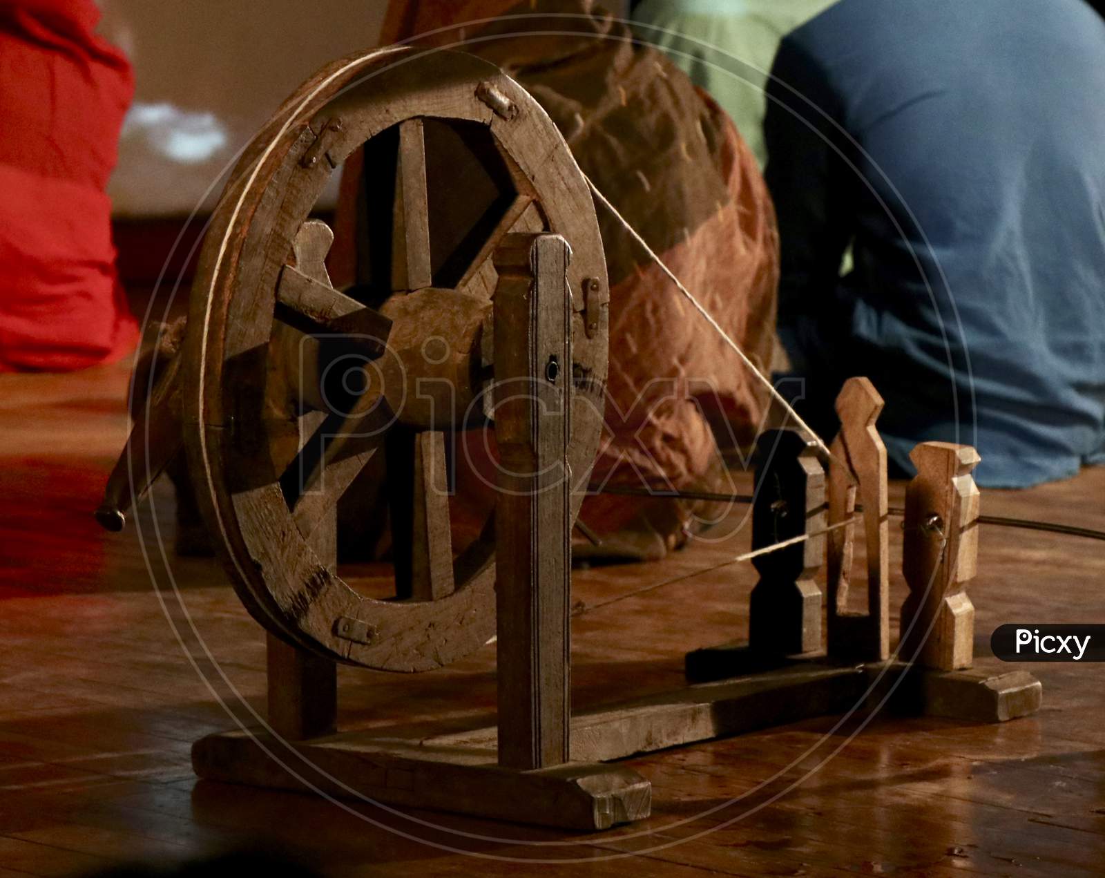 A spinning wheel charkha is a device for spinning thread or yarn from fibres