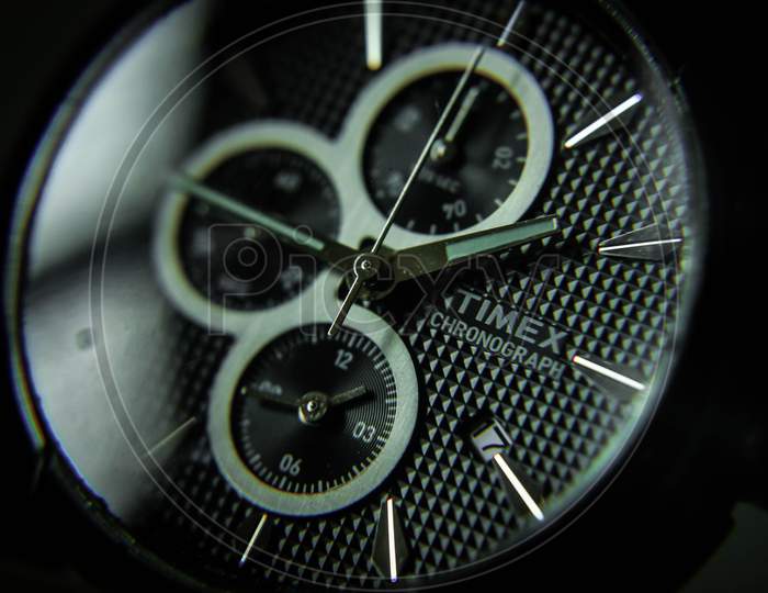 Kolkata, West Bengal, India - February 2020: Kolkata, West Bengal, India - February 2020: Macro photography of wrist watch, Timex chronograph watch, close up shot of watch.