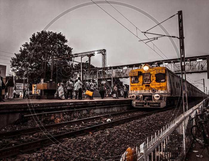 Rail Station, Kolkata, West Bengal, India - July 2019: Crowded Howrah station, A busy city life, Train is waiting at station