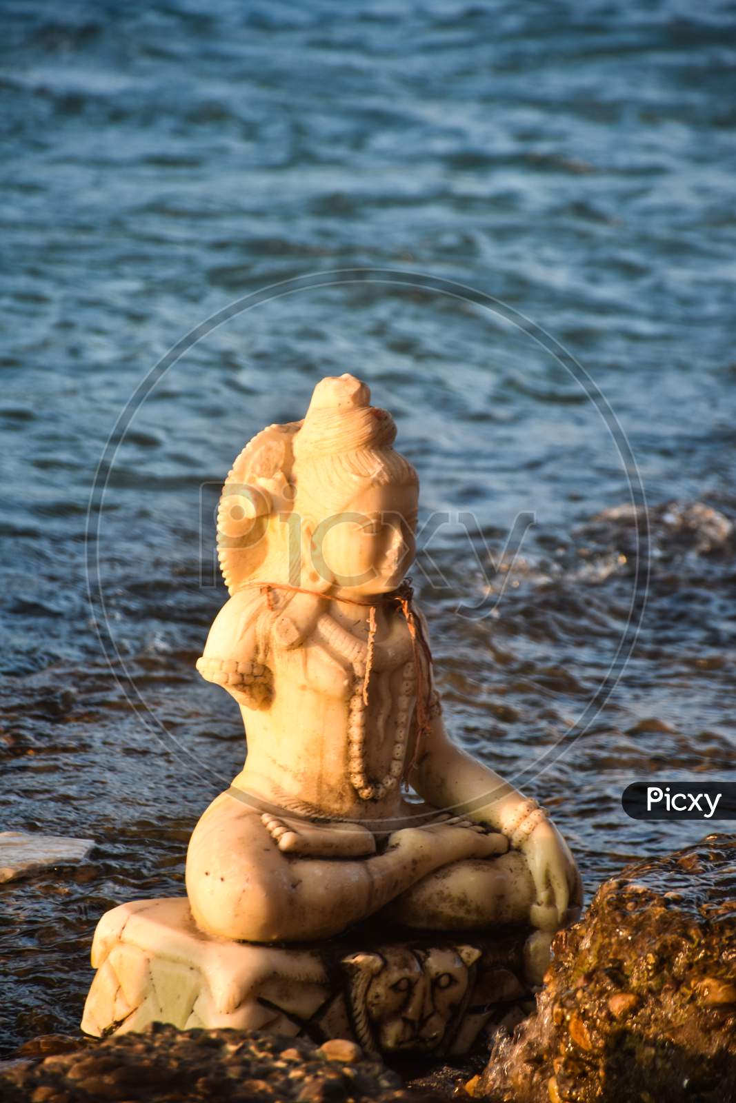 god shiv statue on the beach in haridwar india