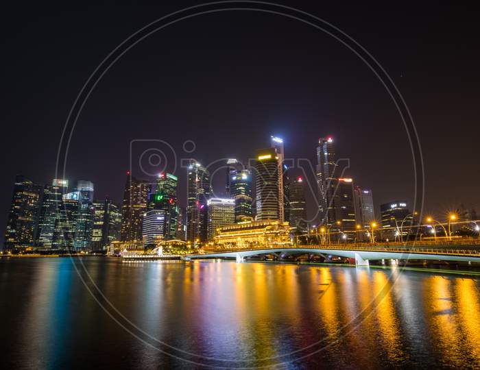 Singapore cityscape at dusk. The landscape of Singapore business building around Marina bay.