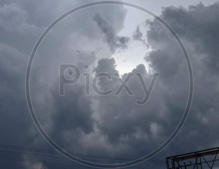 The dark clouds on dramatic sky background before rainy weather
