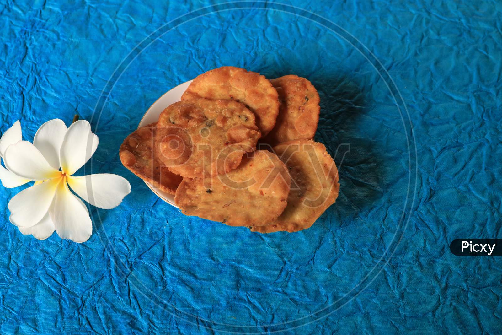 Indian Snacks or Sweets in a Plate on an isolated Background