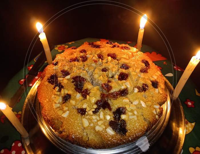 Beautifull Birthday fruit cake decoration with many candles