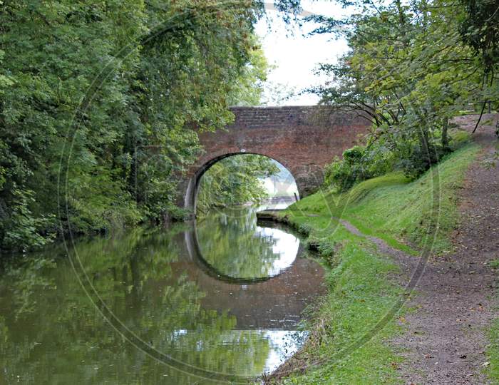 An Arched Bridge On The Grand Union Canal At Lapworth In Warwickshire, England