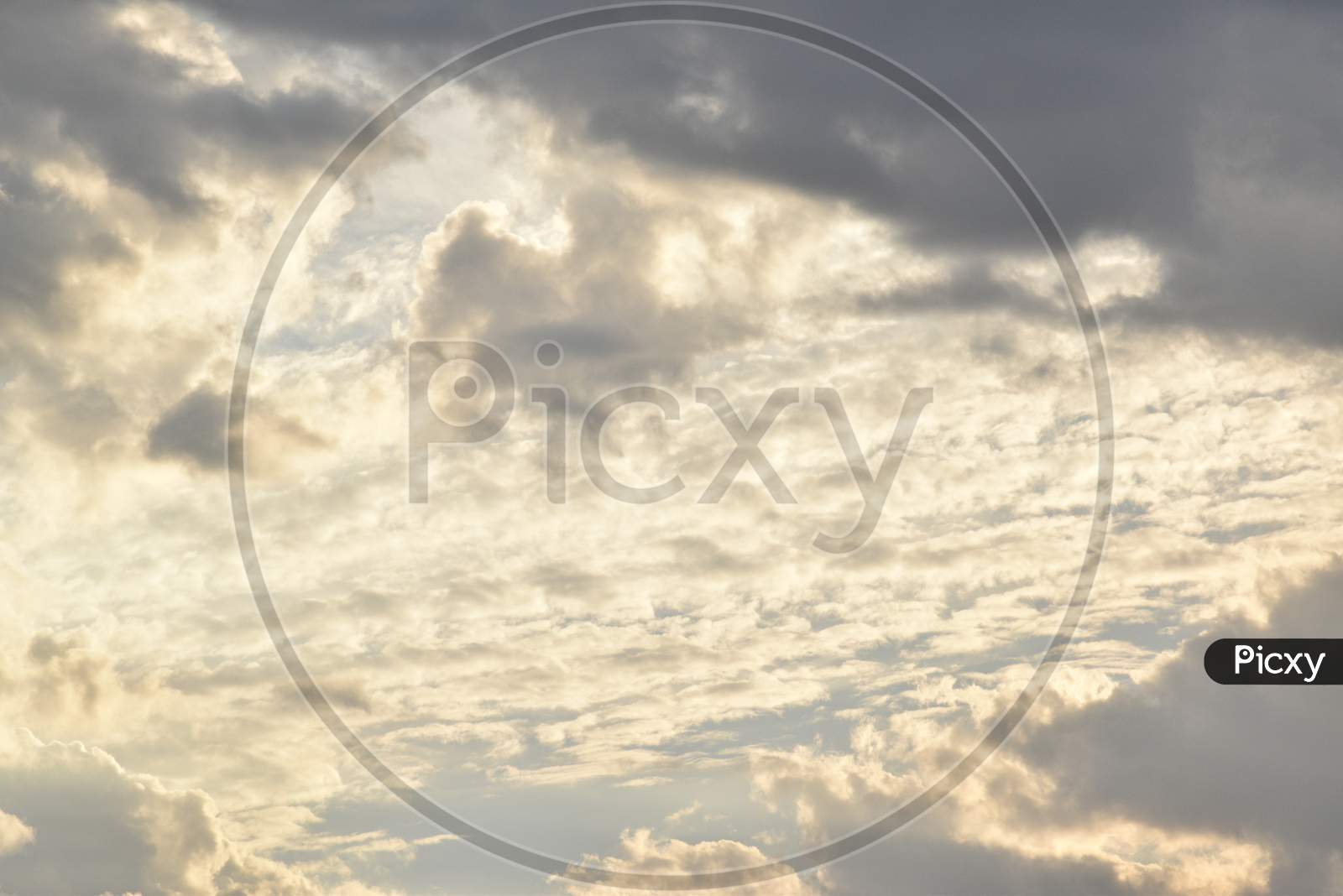 Dramatic Sunrise And Rainy Storm Sky With Dark Cloud.Abstract Nature Background.April 2020.
