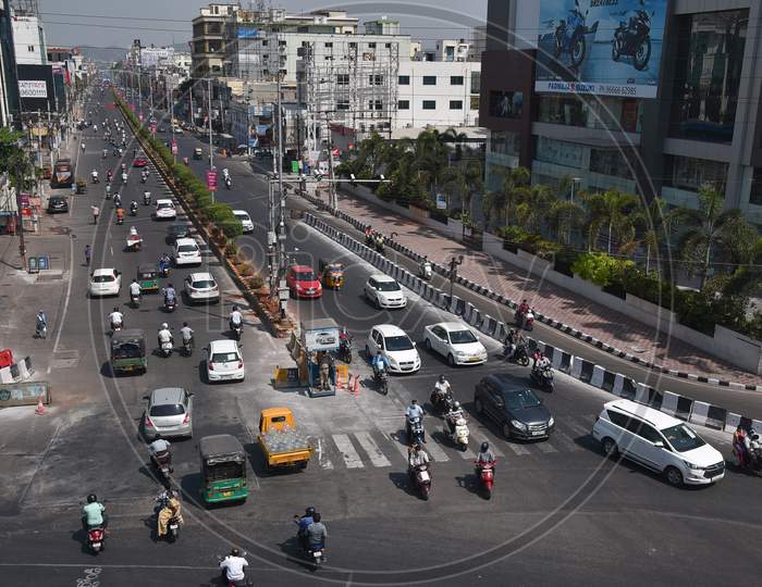 Vehicles Ply At MG Road, Following The Relaxation Of Restrictions, During The Ongoing Coronavirus Lockdown, In Vijayawada.