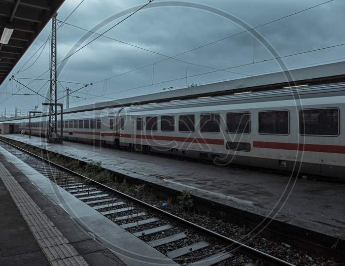 Stuttgart,Germany - October 10,2019:Main Station This Is A Platform Of The Big,Old Train Station On A Rainy And Cloudy Day.On The Other Side Is An Ice.