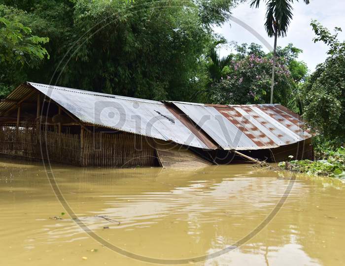 Partially Submerged Houses Pictured At A Flood-Affected Village In Hojai District Of Assam On May 30,2020.
