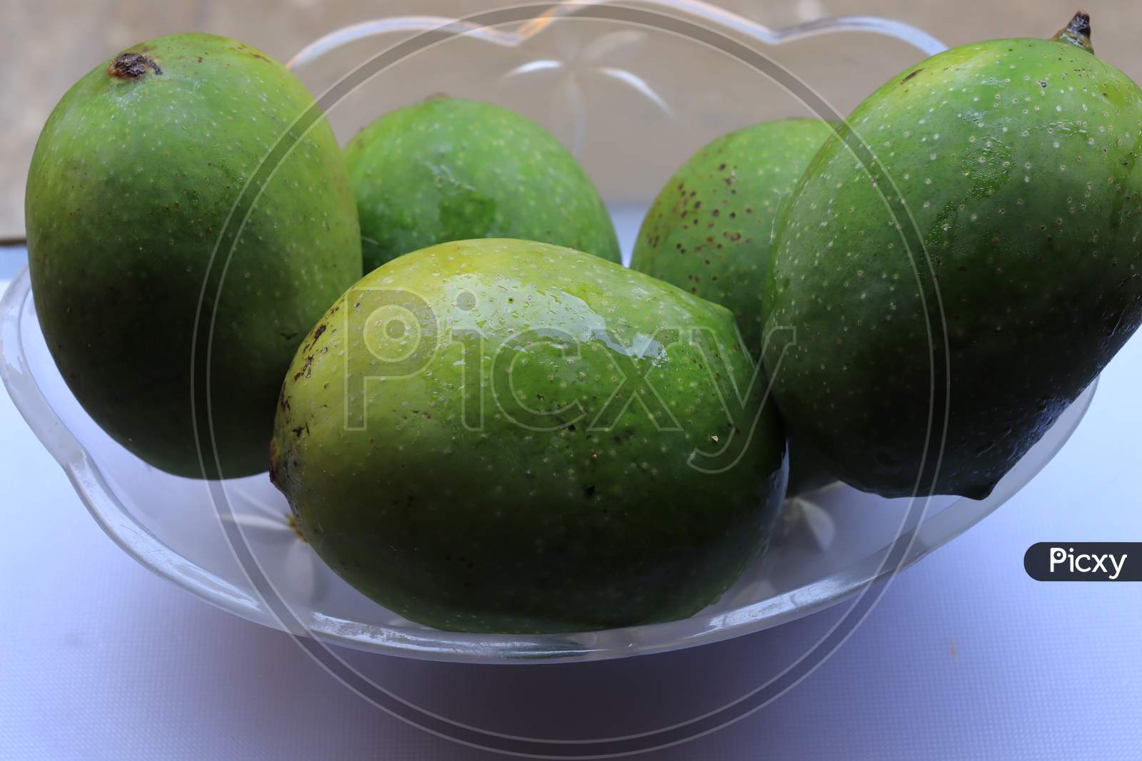 Fresh Green Mango fruit isolated on white background