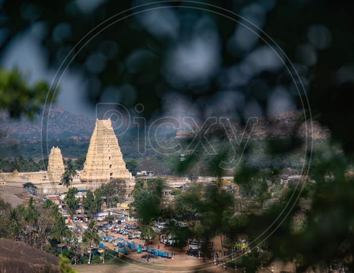 View of Virupaksha Temple through a Tree