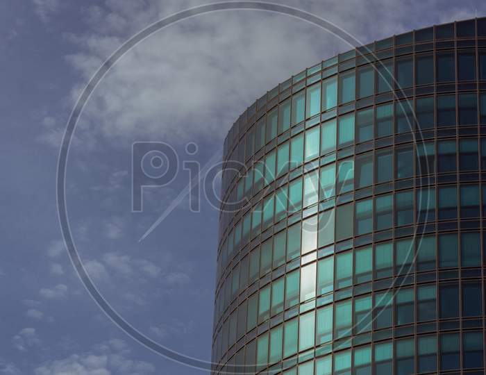 A Big Office Tower On A Summer Day,Shot From A Public Place