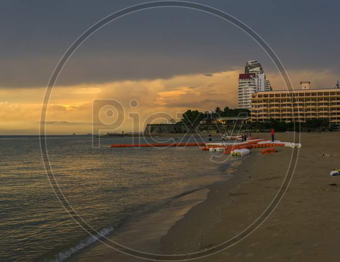 Pattaya,Thailand - October 26,2018: The Beach(Evening) At This End Of The Beach Is The Expensive Dusit Hotel At The Time Of Sundown.