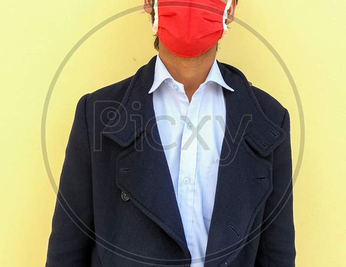 Photo of a businessman wearing coronavirus mask to protect from the coronavirus stock photo