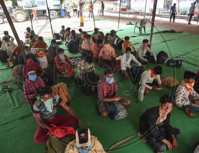 Migrant Workers Wait At A Relief Shelter To Board A Special Train To Reach Their Native Places, During The Ongoing Coronavirus Lockdown, In Guntur District.