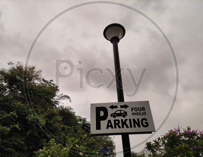 Rainy sky with a sign board kochi, kerala