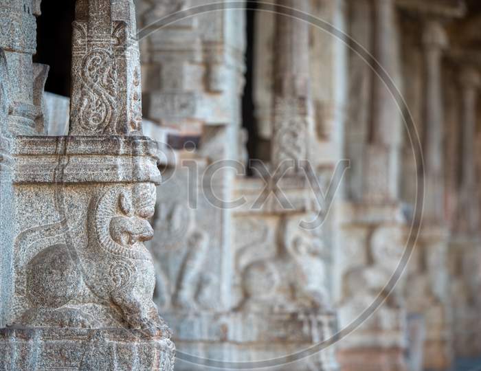 Close up shot of Stone Carved Pillars in An Ancient Hindu Temple in Hampi