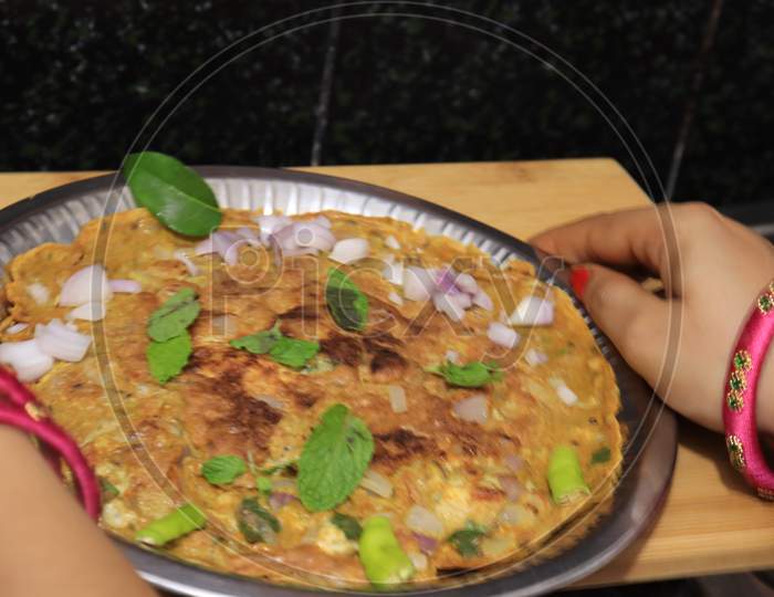 Egg Omelette isolated on wood background