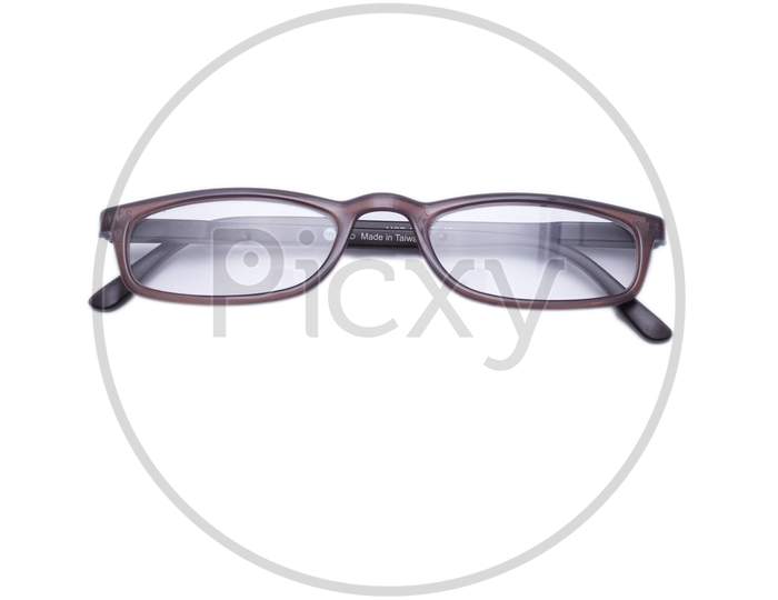 Top View Photo Of Reading Specs,Brown And Black Colour Gradient Frame.