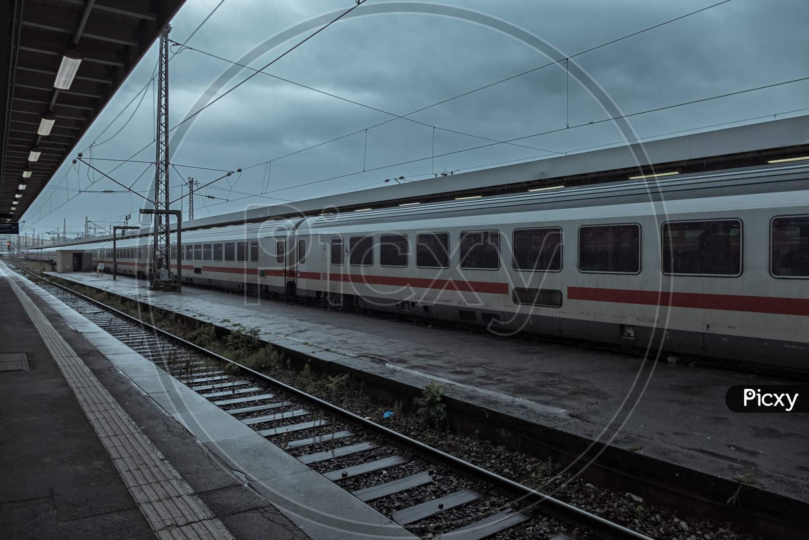 Stuttgart,Germany - October 10,2019:Main Station This Is A Platform Of The Big,Old Train Station On A Rainy And Cloudy Day.On The Other Side Is An Ice.