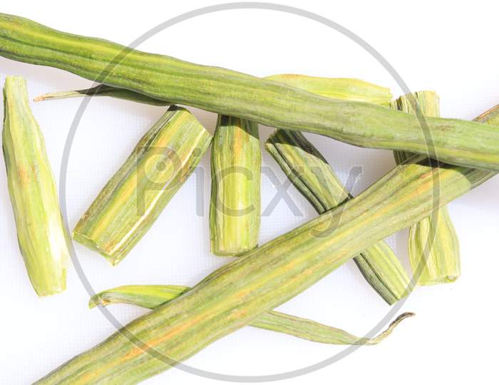 Drumstick Pods or Moringa Oleifera Poss Vegetable Isolated on White Background