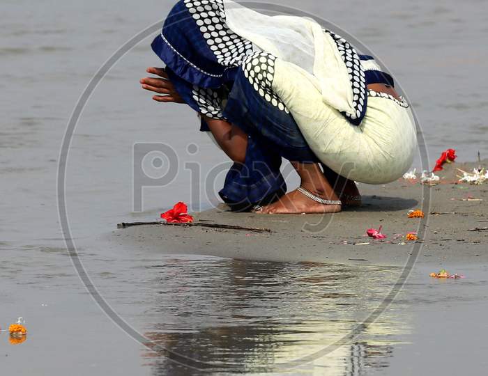 Hindu Devotee Offering Prayers To Holy River Triveni Sangam In Prayagraj On May 30,2020