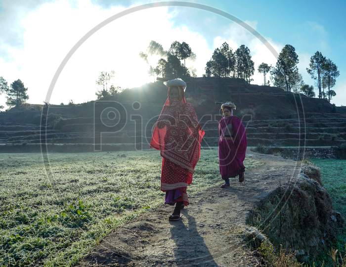 Almora, Uttrakhand / India- May 30 2020 : Village Women Going To The Fields In A Beautiful Morning In The Mountains.