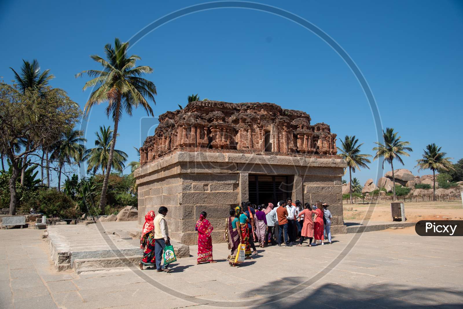 Visitors at Badavalinga Temple in Hampi